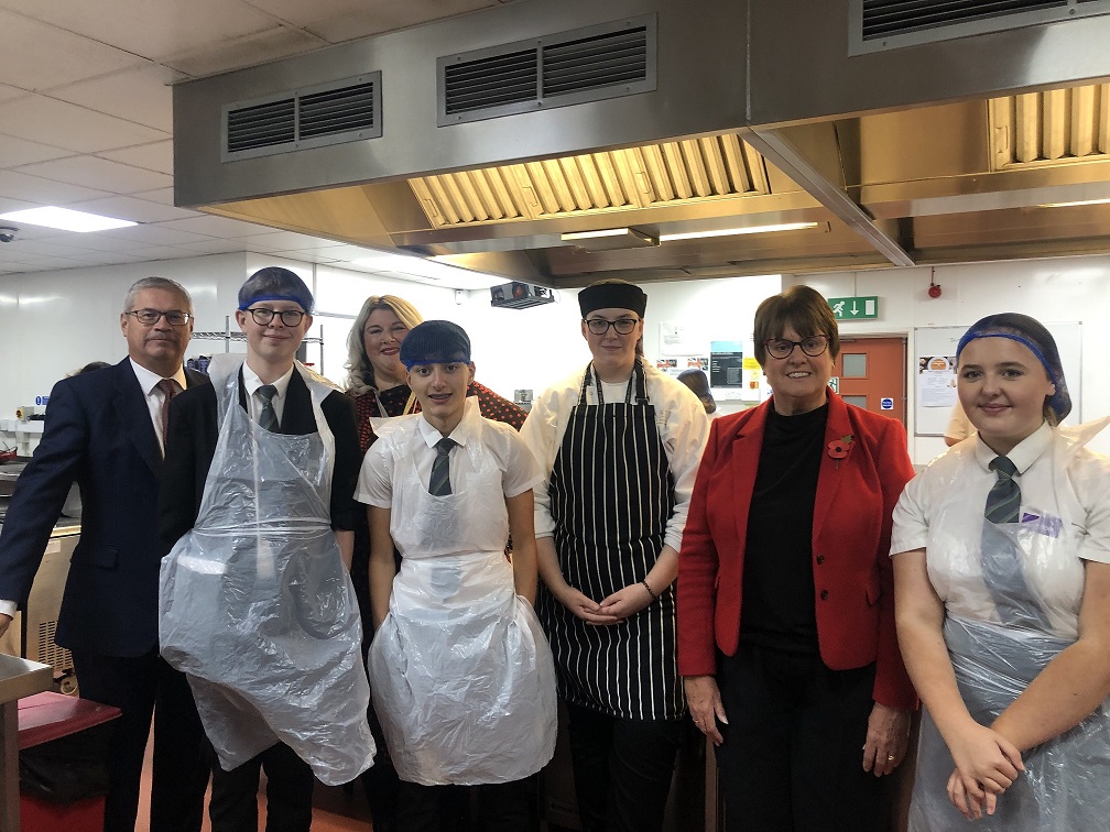 Springwell students with one of the catering students, Councillor Tricia Gilby and Chair of the Town Deal Board Ivan Fomin