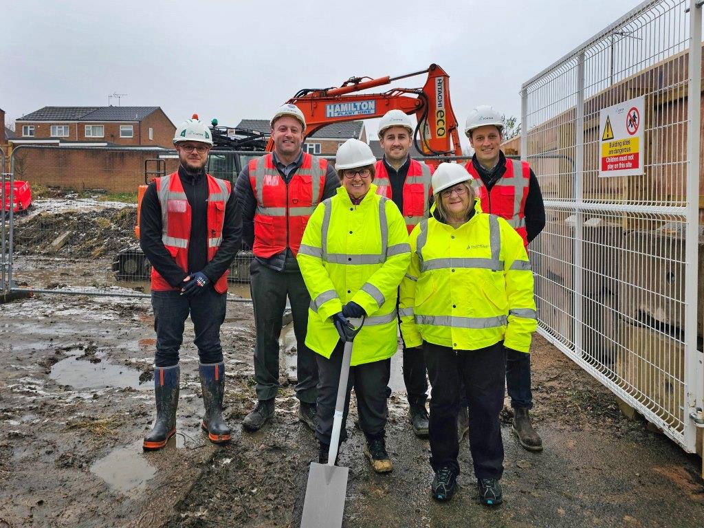 (back row, left to right) Dan Huxley (site manager, Fortem) Russ Gale (project manager, Fortem), Tom Nicholson (commercial manager, Fortem) and James Taylor (senior operations manager, Fortem) (front row, left to right) Councillor Tricia Gilby (Leader of Chesterfield Borough Council) and Councillor Jean Innes (cabinet member for housing)